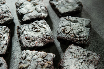 Chocolate brownies on a dark background