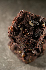 Chocolate brownies on a dark background	