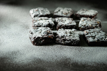 Chocolate brownies on a dark background