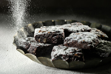 Chocolate brownies on a dark background