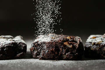Chocolate brownies on a dark background