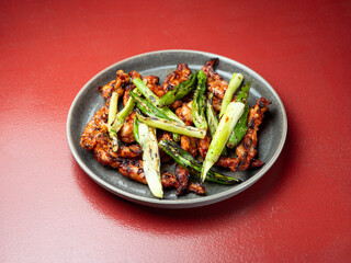 spicy grilled chicken on plate	