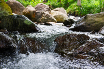 mountain river flows through the rocks
