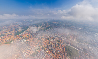 Bologna, Italy. Historical Center. Panorama of the city on a summer day. Flying in the clouds. Aerial view