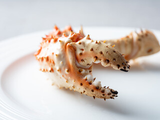 Boiled crab legs on a plate