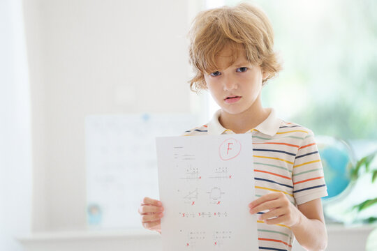 Kids fail math test in school. Child after exam.