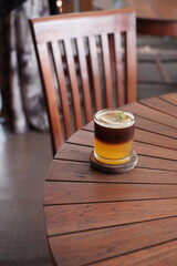 cup of orange coffee