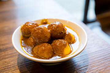 Curry fish ball served dish