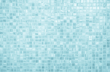 Fototapeta premium Blue light ceramic wall chequered and floor tiles mosaic background in bathroom, kitchen. Design pattern geometric with grid wallpaper texture decoration pool. Simple seamless abstract surface clean.