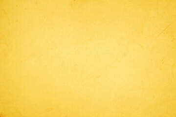Yellow concrete stone texture for background in summer wallpaper. Cement and sand wall of tone vintage minimal. Concrete abstract wall of light yellow color, cement texture white blank for home decor.