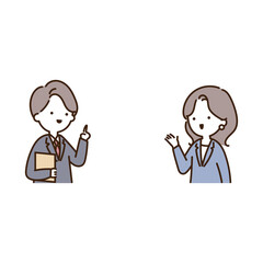 指をさして案内をする2人の会社員男女