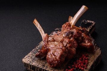 Delicious juicy meat on the bone or rack of lamb or grilled veal