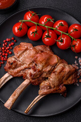 Delicious juicy meat on the bone or rack of lamb or grilled veal