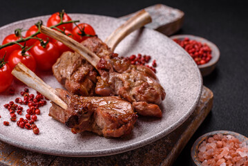 Delicious juicy meat on the bone or rack of lamb or grilled veal
