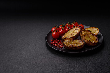 Delicious potato halves in skins baked on the grill