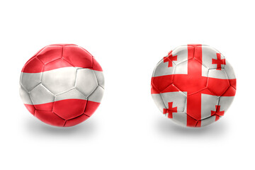 football balls with national flags of georgia and austria ,soccer teams. on the white background.