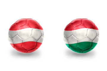 football balls with national flags of hungary and austria ,soccer teams. on the white background.