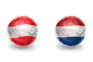 Obraz premium football balls with national flags of netherlands and austria ,soccer teams. on the white background.