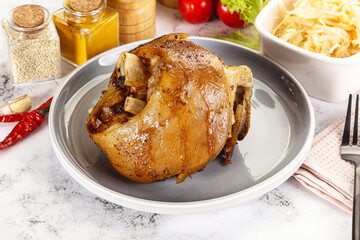 Baked pork knee with spices