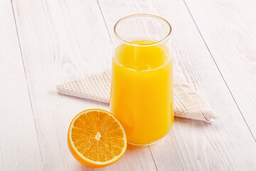Sweet fresh orange juice in the glass