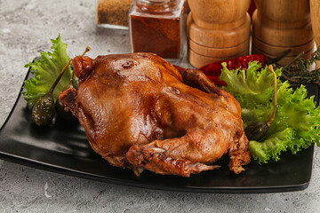 Baked small chicken with spices
