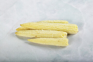 Raw sweet baby corn heap