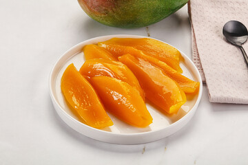 Canned mango slices in the bowl