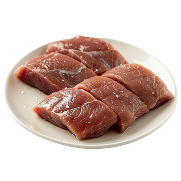 Fresh raw tuna steaks on a white plate.