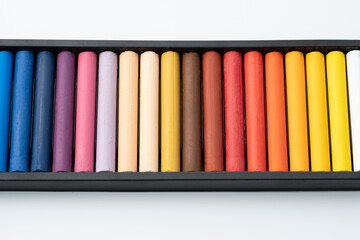 Set of colorful oil pastels on white background.Oil pastels color in box isolated on white background. Crayons	
