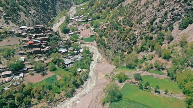 Aerial top down drone footage of Kalash Valley and Chilam Joshi Festival , Rumbur , Chitral, Pakistan