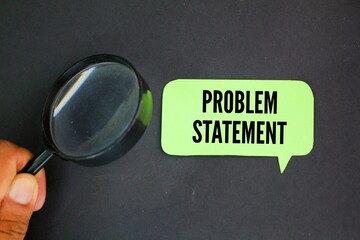 with a magnifying glass and colored paper with the word problem statement