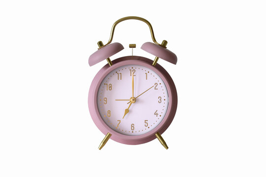 Mechanical alarm clock shape of past time Pink color on white background isolated