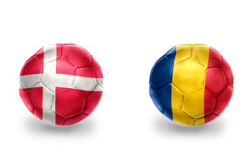 football balls with national flags of denmark and romania ,soccer teams. on the white background.