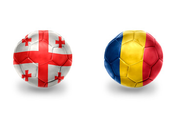 football balls with national flags of georgia and romania ,soccer teams. on the white background.
