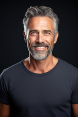 Obraz premium Happy and smiling middle-aged man portrait