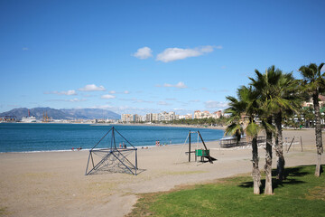 Beach with trees and playground