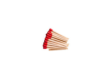 An isolated bundle of matches with red tips suggesting ignition, ideas, or energy