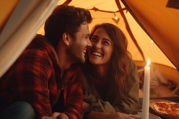 A couple relaxing together with a delicious pizza in a cozy tent setting - Powered by Adobe