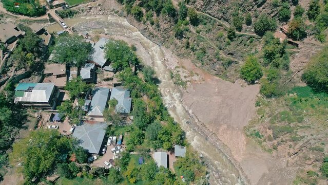 Aerial top down drone footage of Kalash Valley and Chilam Joshi Festival , Rumbur , Chitral, Pakistan