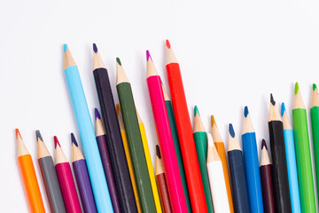 Fototapeta premium Colored pencils for school, background with colorful pencils, colorful pencils isolated on white background,color pencils with different color,colorful crayons background