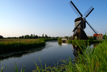 Traditional Dutch windmill on a sunny summer day