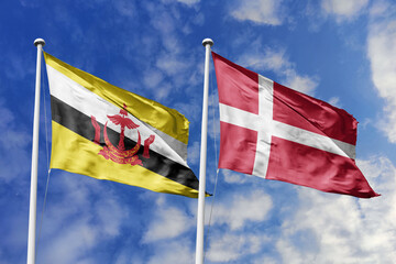 3d illustration. Brunei and Denmark Flag waving in sky. High detailed waving flag. 3D render. Waving in sky. Flags fluttered in the cloudy sky.