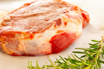 Fresh Raw Veal Cut of Meat with Spices and Rosemary Ready to Cook Close Up