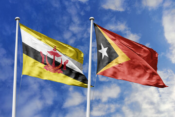 3d illustration. Brunei and East Timor Flag waving in sky. High detailed waving flag. 3D render. Waving in sky. Flags fluttered in the cloudy sky.