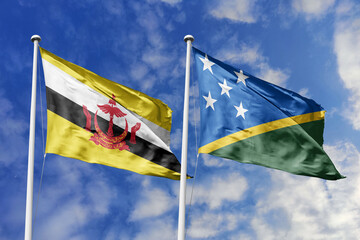 3d illustration. Brunei and Solomon Islands Flag waving in sky. High detailed waving flag. 3D...