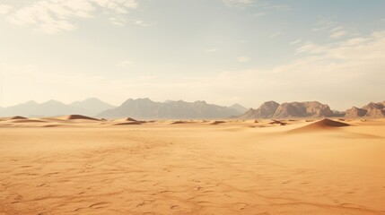 desert landscape with towering sand dunes and rugged mountains in the distance