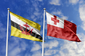 3d illustration. Brunei and Tonga Flag waving in sky. High detailed waving flag. 3D render. Waving in sky. Flags fluttered in the cloudy sky.