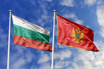 3D illustration. Bulgaria and Montenegro Flag waving in the sky. High detailed waving flag. 3D render. Waving in the sky. Flags fluttered in the cloudy sky.