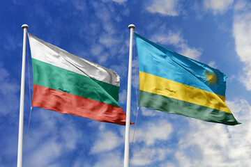 3D illustration. Bulgaria and Rwanda Flag waving in the sky. High detailed waving flag. 3D render. Waving in the sky. Flags fluttered in the cloudy sky.