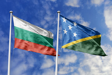 3D illustration. Bulgaria and Solomon Islands Flag waving in the sky. High detailed waving flag. 3D render. Waving in the sky. Flags fluttered in the cloudy sky.